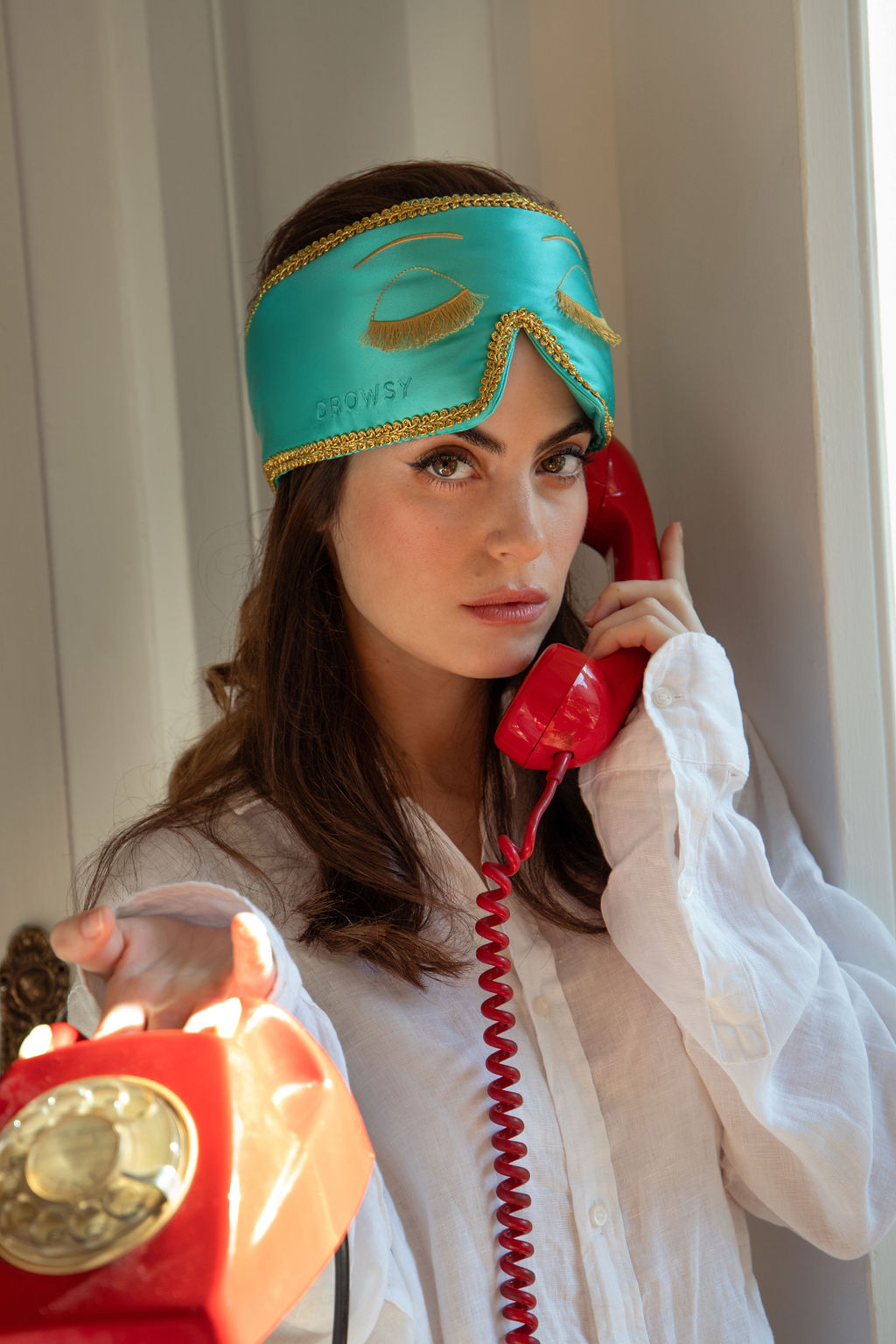 Image of woman wearing a Drowsy sleep mask