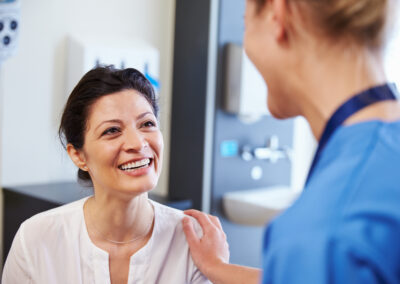 Image of a surgeon in consultation with a patient