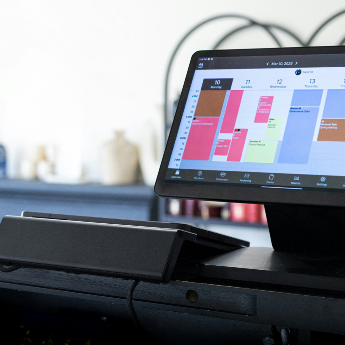 Image of a computer screen with a diary and appointments booked in